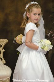 First communion dress with eyelet floral design